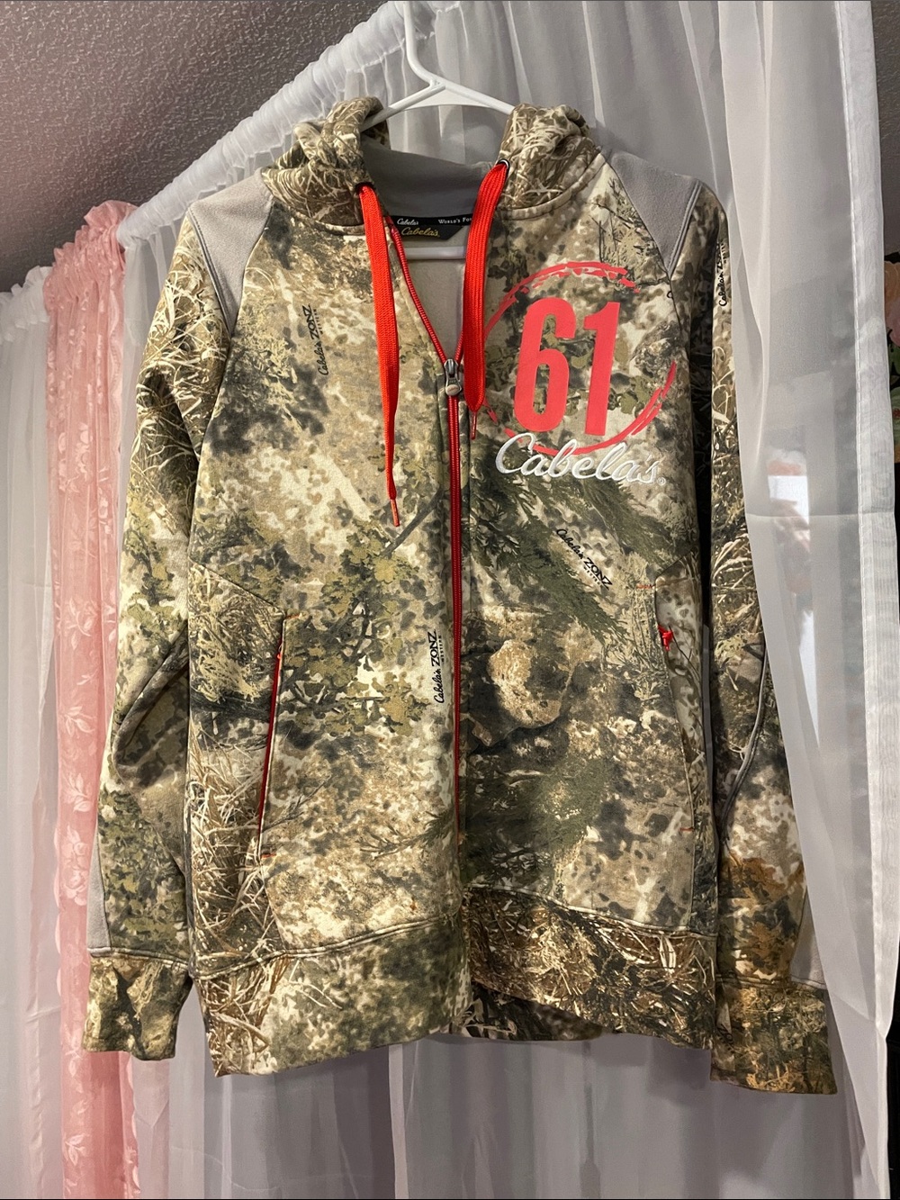 Cabela's women’s Camo Hooded Puffer with Red Accents